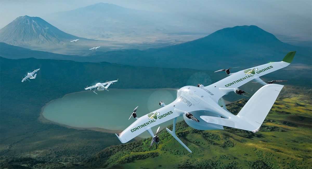 Drones in the air over valley