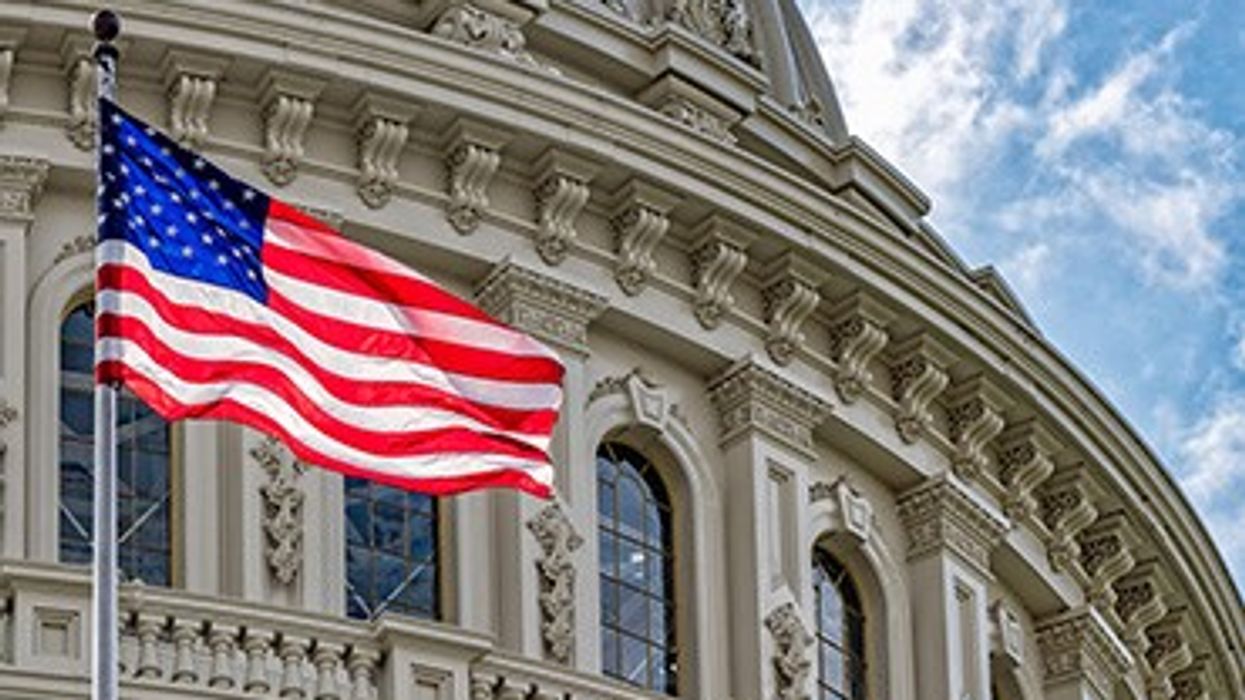 US capitol with flag