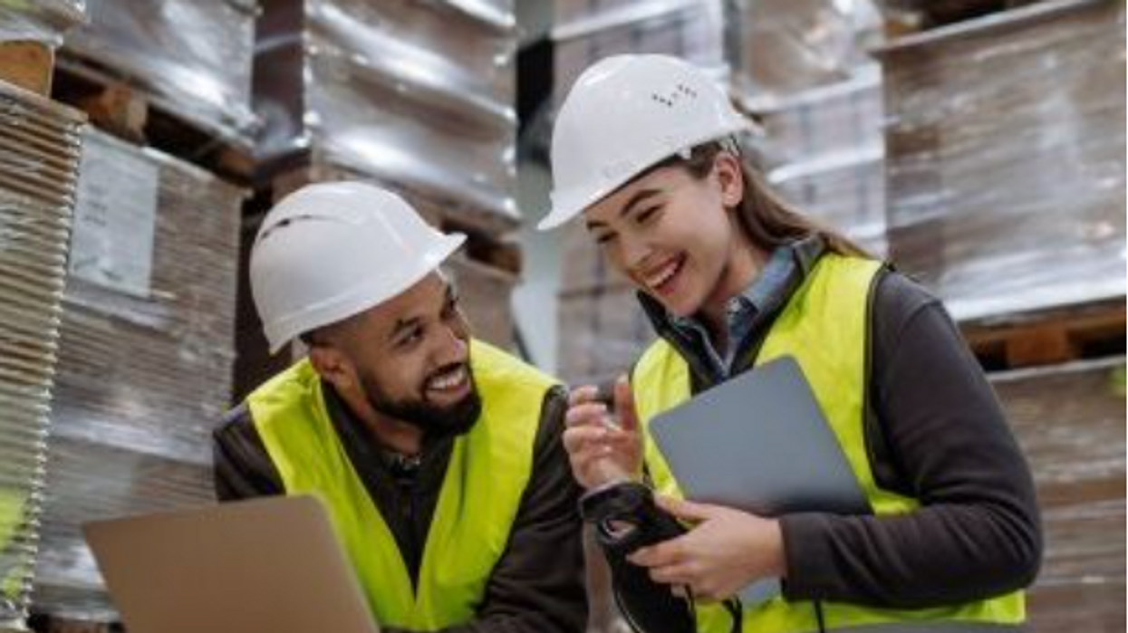 warehouse workers with freight pallets